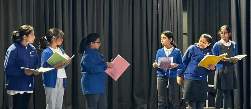 Children at Elmhurst Primary School perform in the theatre at the UKLA Open Day.